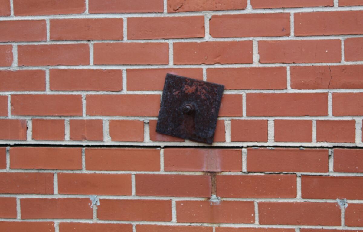 Black Mountain Police Chief Steve Parker says this wall of the Public Safety Building is bowing, that is why braces have been installed.