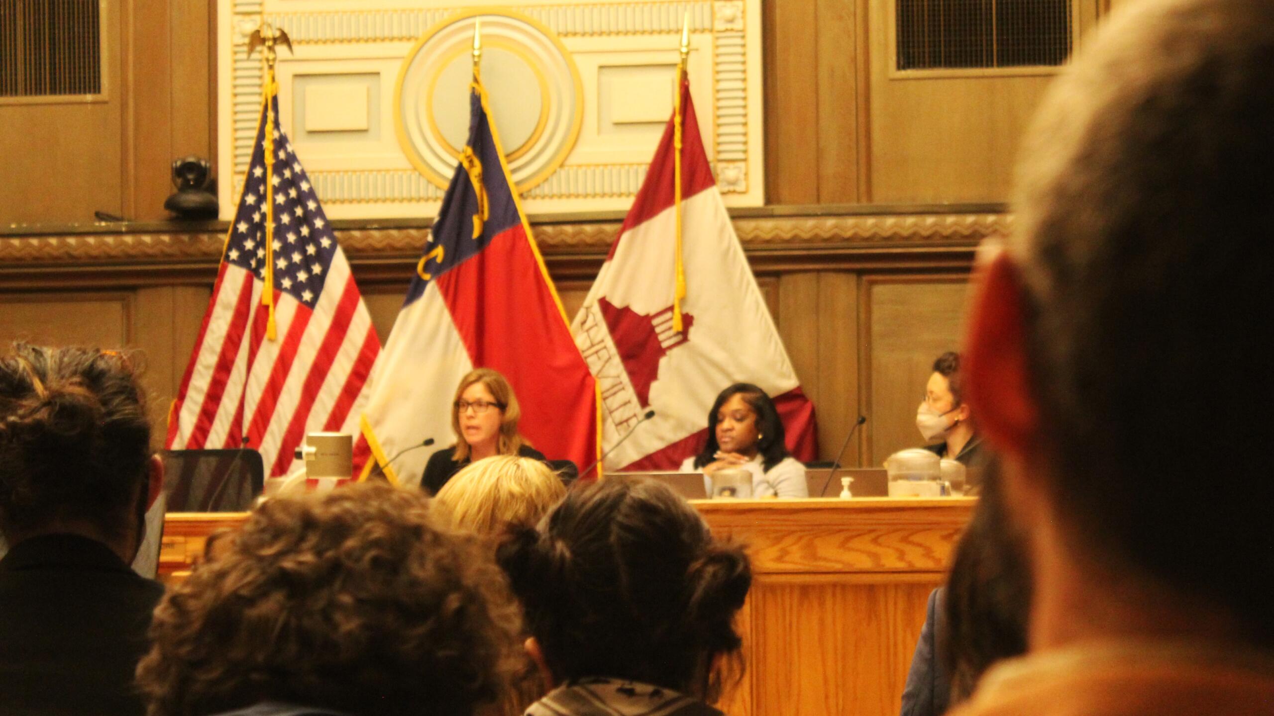 Asheville Mayor Esther Manheimer addresses a crowd after a heated public comment period about the war between Israel and Hamas in Gaza.