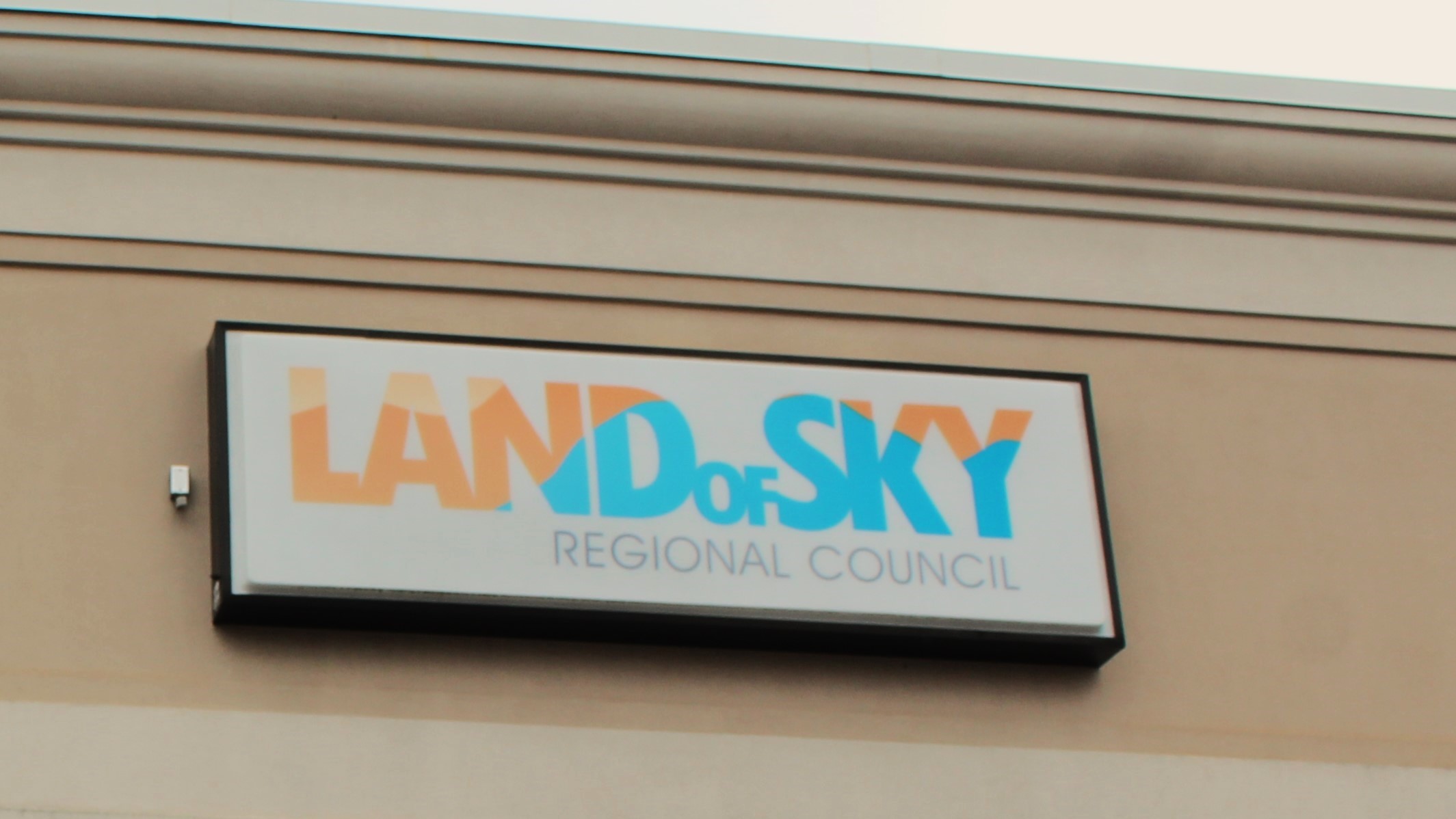 Logo of the Land of Sky Regional Council.