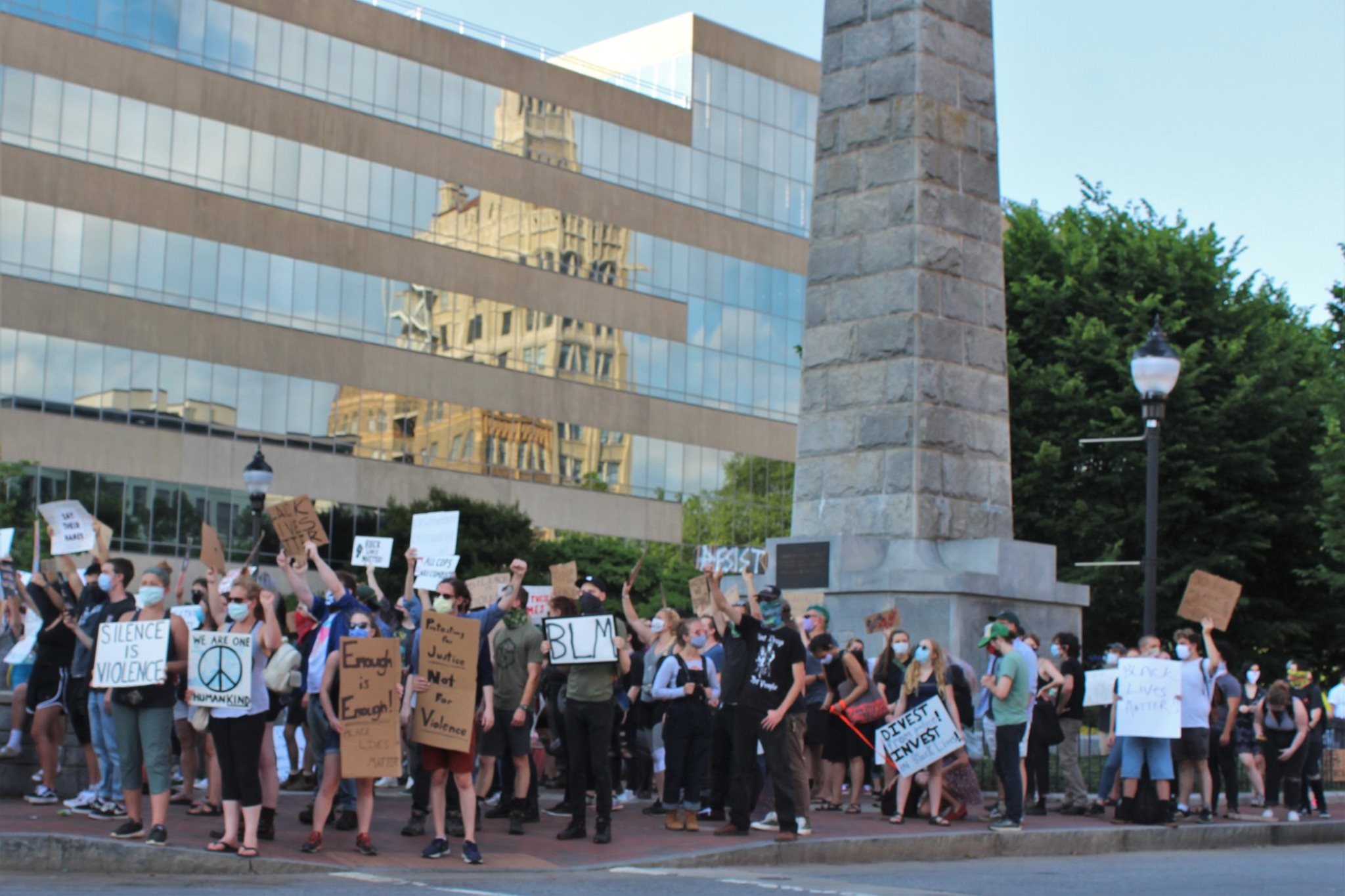 FILE: Black Lives Matter protesters surround the Vance Monument in the summer of 2020.