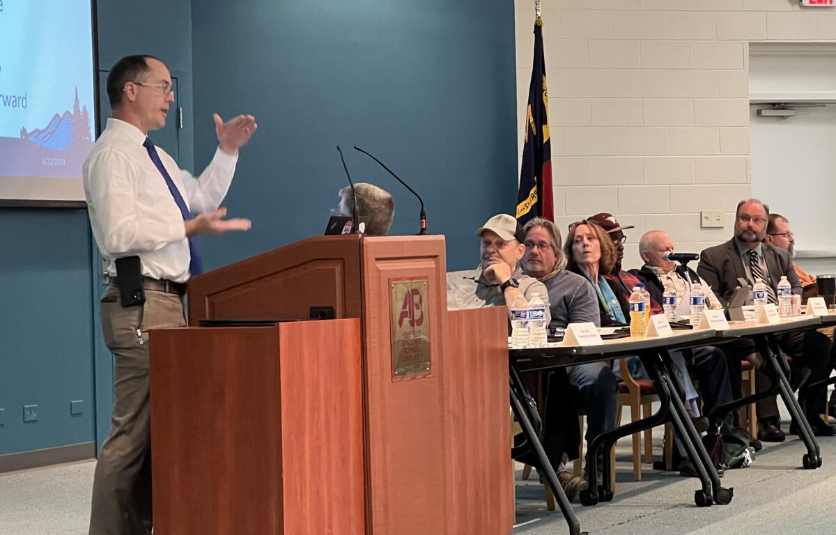 Buncombe County Planning Director Nathan Pennington addresses the crowd Monday, April 22, during the county Planning Board's consideration of regulations on short-term rentals at A-B Tech's Ferguson Auditorium in Asheville.
