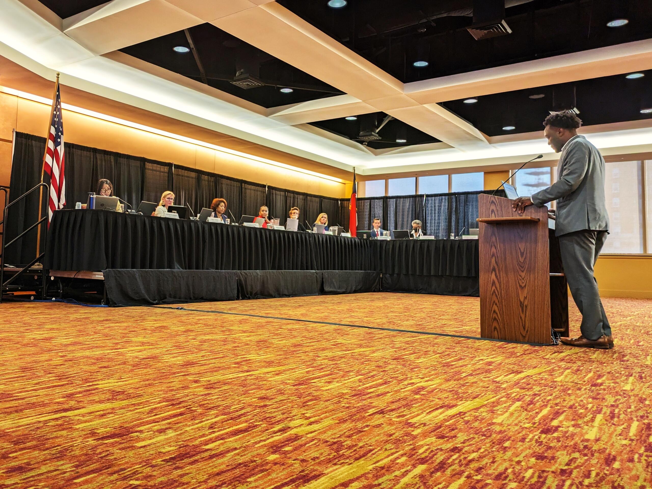 Asheville City Council members listen to public comments about a proposed downtown Business Improvement District during a three-hour public hearing Tuesday, April 23, 2024, at Harrah's Cherokee Center.