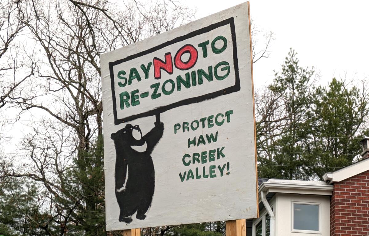 A sign along Tunnel Road in April 2024 alluded to concerns over a proposed 95-unit subdivision in the New Haw Creek area.