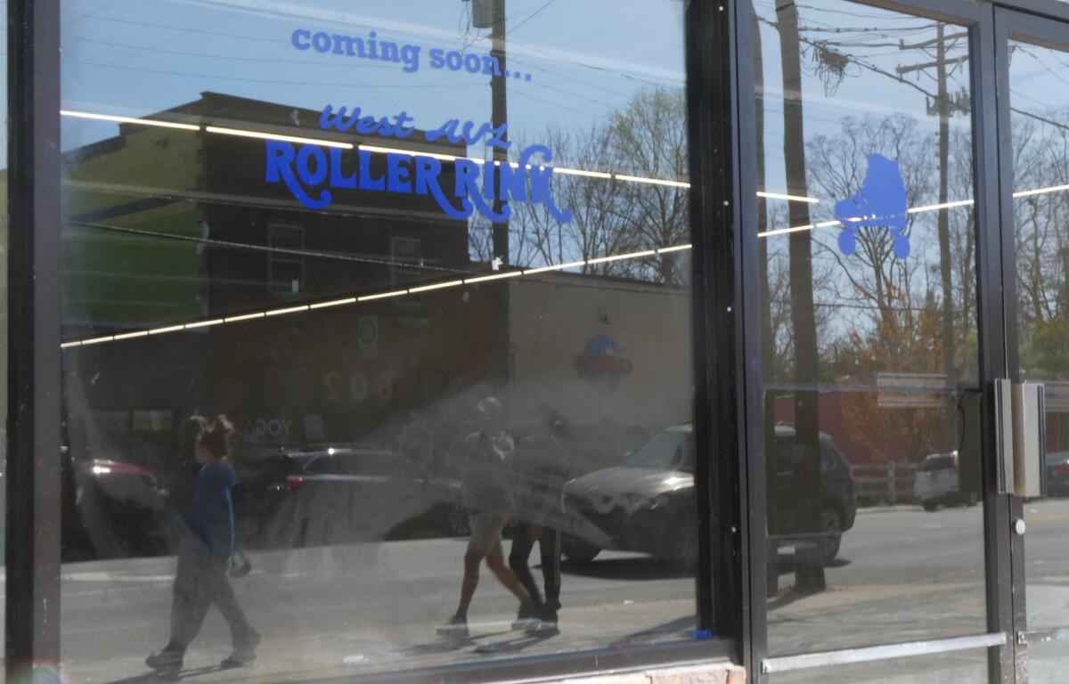 Hoax alert: it's not true what the window lettering says. There is not an actual roller rink planned for a vacant dollar store building on Haywood Road, real estate broker A. Ryan Israel says.