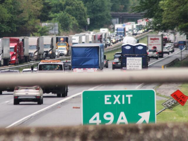 Interstate 26 traffic around Hendersonville was clogged from the morning well into the afternoon Tuesday after a fiery non-injury accident in a construction zone near exit 49B.