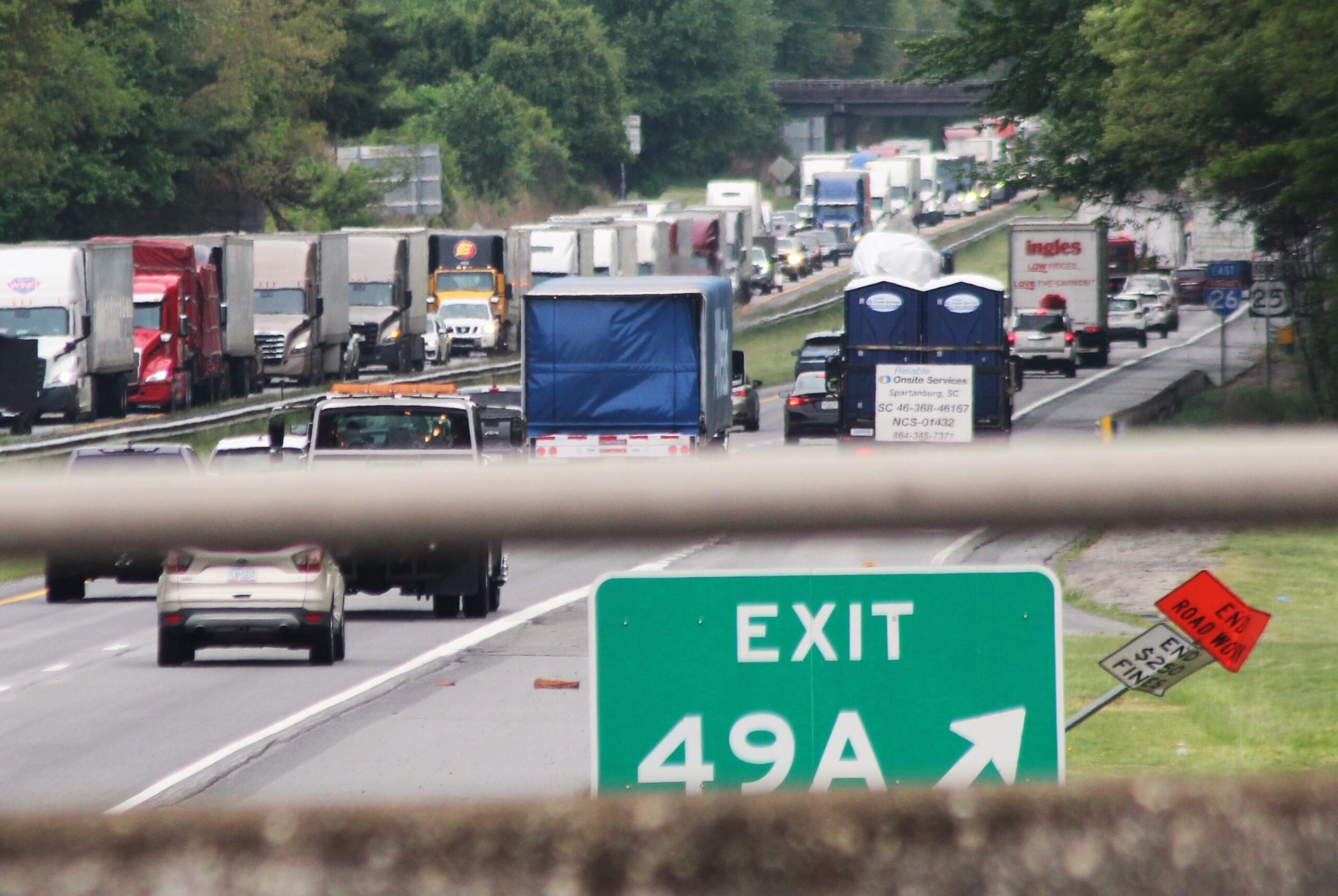 Interstate 26 traffic around Hendersonville was clogged from the morning well into the afternoon Tuesday after a fiery non-injury accident in a construction zone near exit 49B.