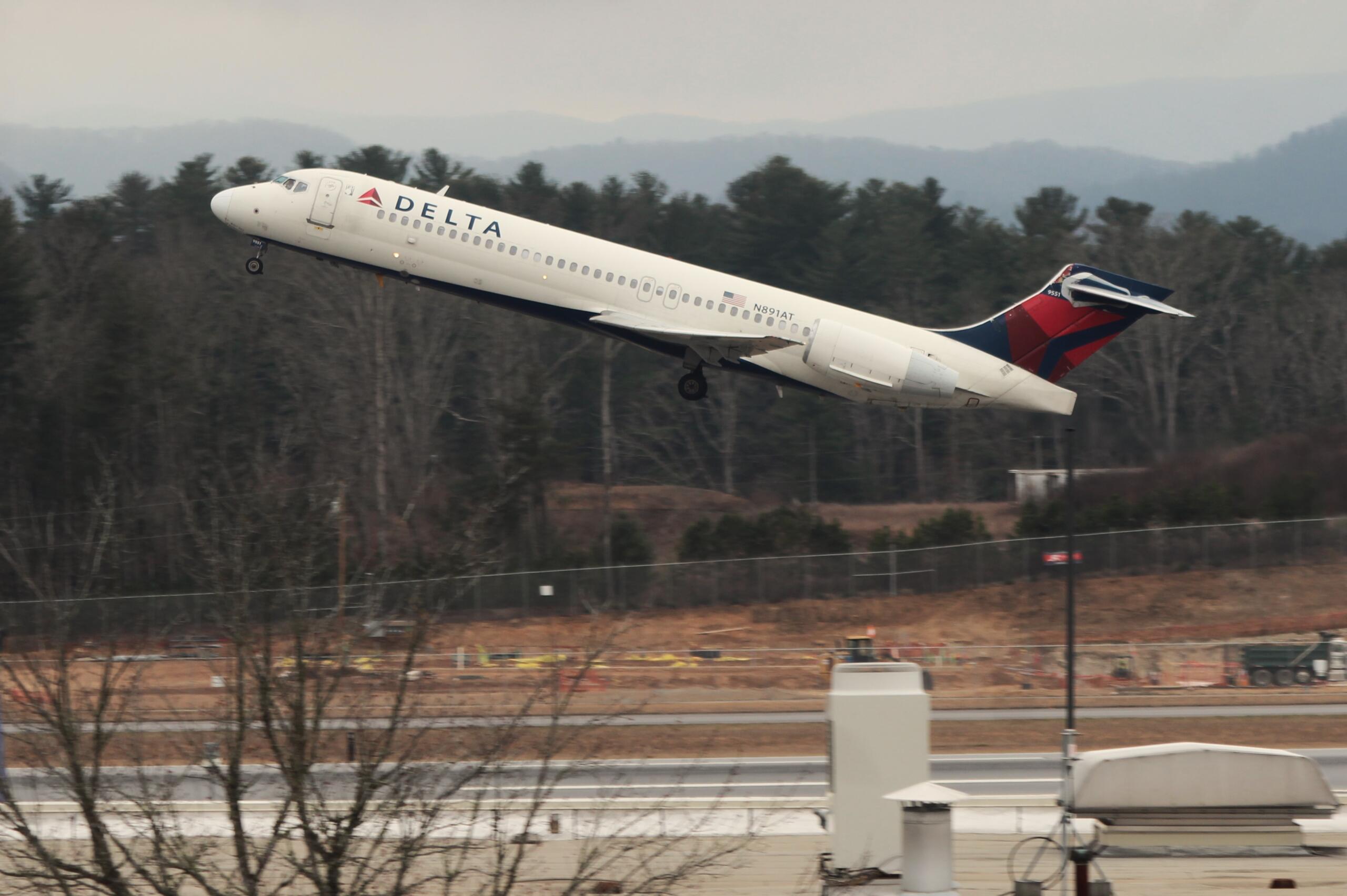 A flight departs in February 2024 from Asheville Regional Airport, where passenger use figures have been soaring and a massive expansion plan is underway.
