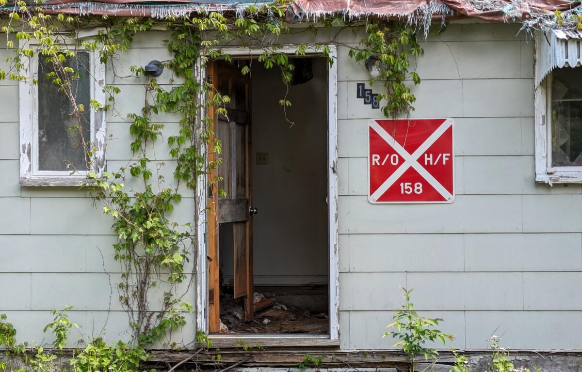 The Asheville City Council has agreed to spend $28,000 to demolish a notorious abandoned home at 158 South French Broad Ave.