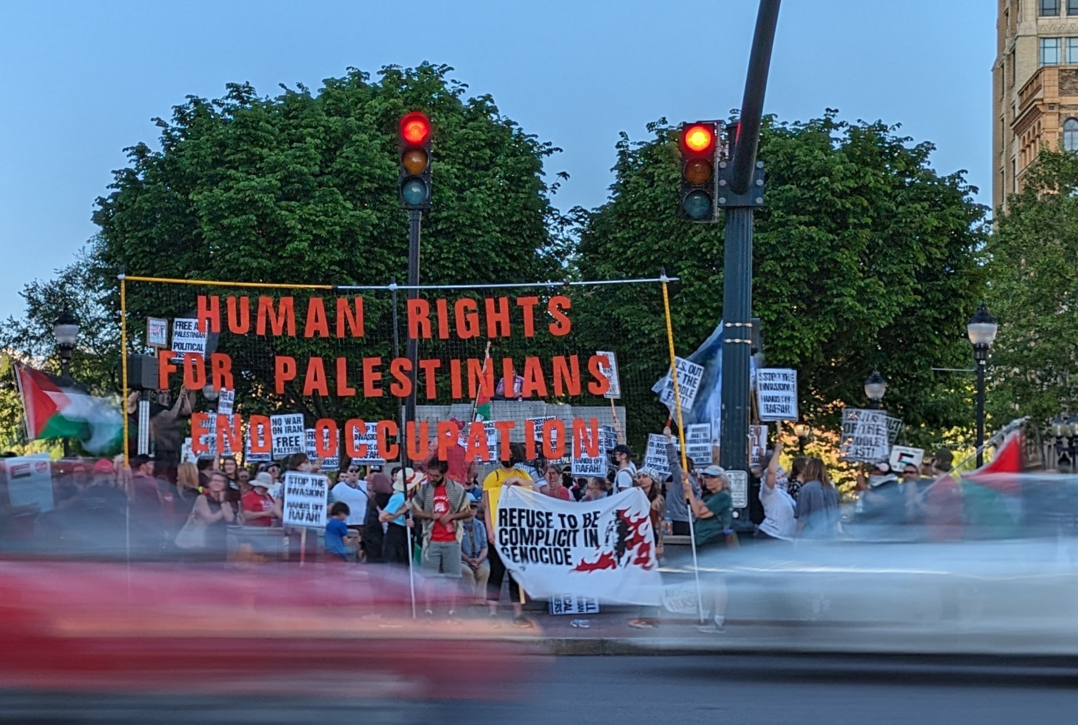 a diverse group of demonstrators gathered Wednesday evening, May 1, 2024, at Pack Square Park, to demand Palestinian rights and an end to Israel's occupation in Gaza.