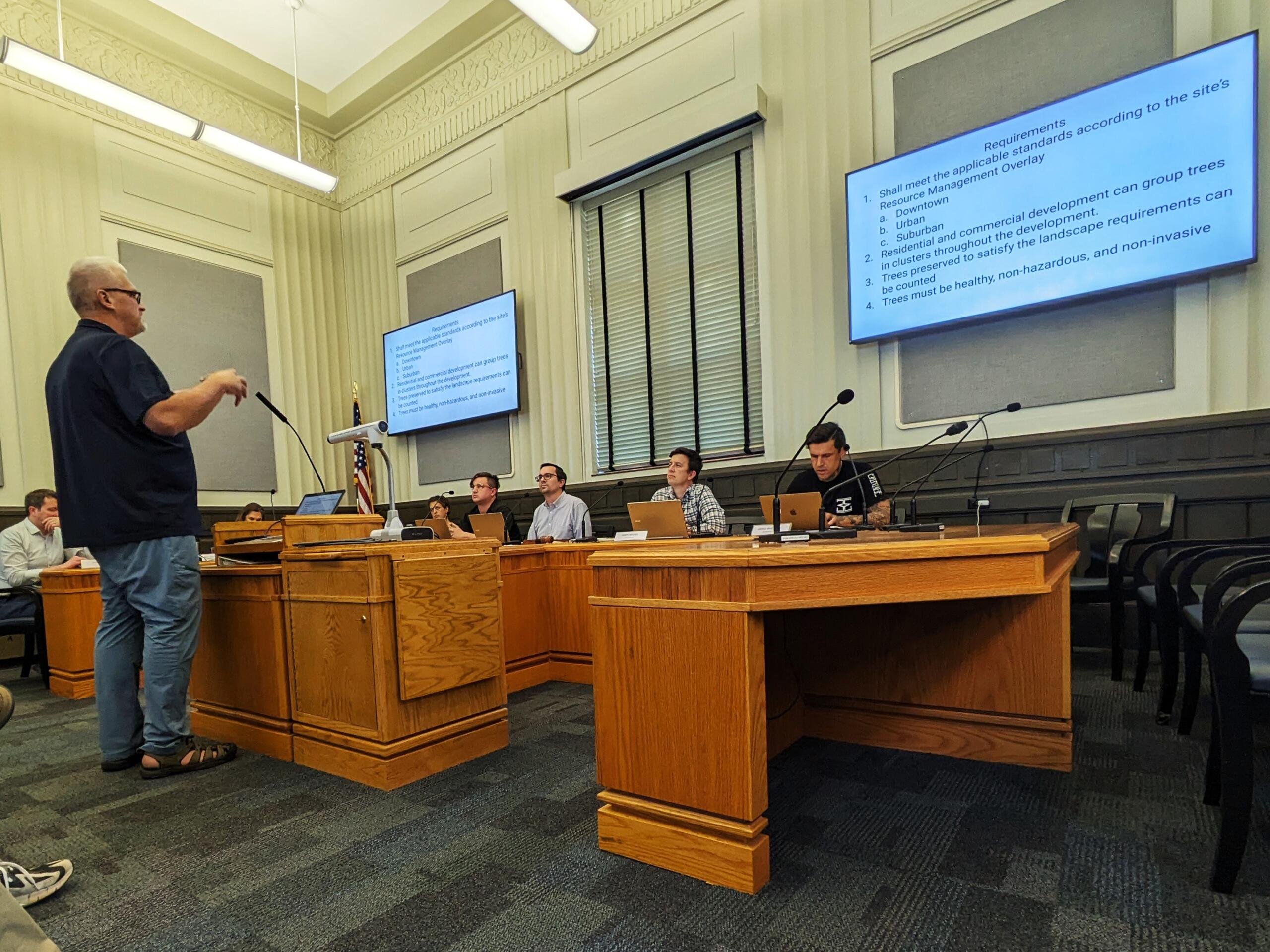 Asheville Planning & Zoning Commission members listen to a presentation on tree preservation Wednesday, May 1, after an announcement that several items were being removed from the night's agenda.