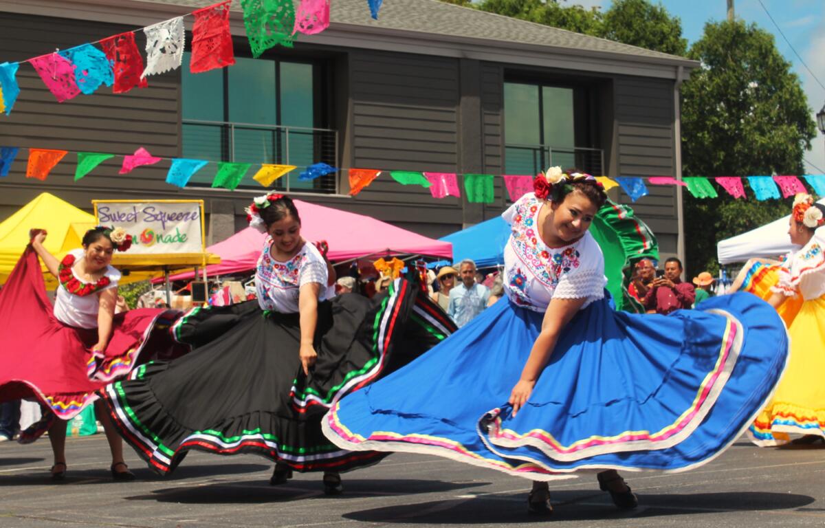 The dance troupe Al Ritmo de mi tierra dances to the rhythms of Mexico at Hola Carolina's Cinco de Mayo celebrations on Sunday, May 5, 2024, in Hendersonville, N.C.