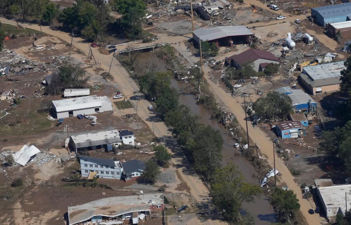 FILE - Damage from Hurricane Helene near Asheville, N.C., is seen during an aerial tour for President Joe Biden, Oct. 2, 2024. (AP Photo/Susan Walsh, File)