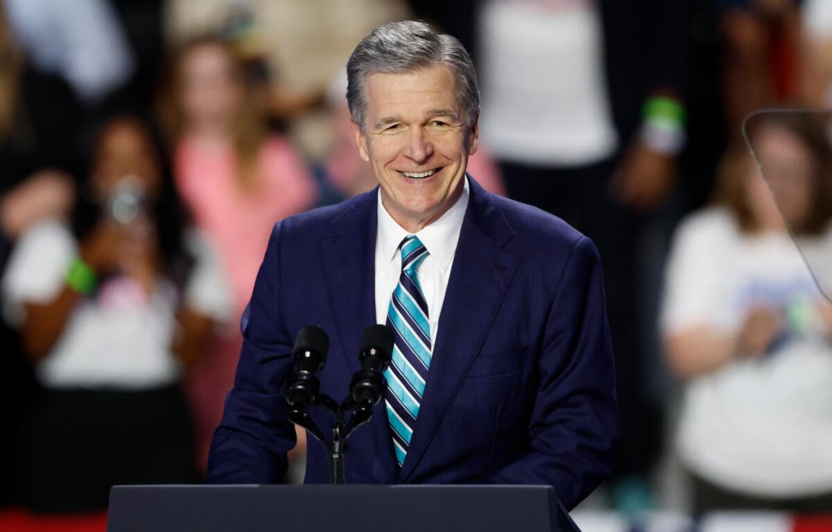FILE - North Carolina Gov. Roy Cooper speaks at a campaign event for Democratic presidential nominee Vice President Kamala Harris in Charlotte, N.C., Thursday, Sept. 12, 2024. (AP Photo/Nell Redmond, File)