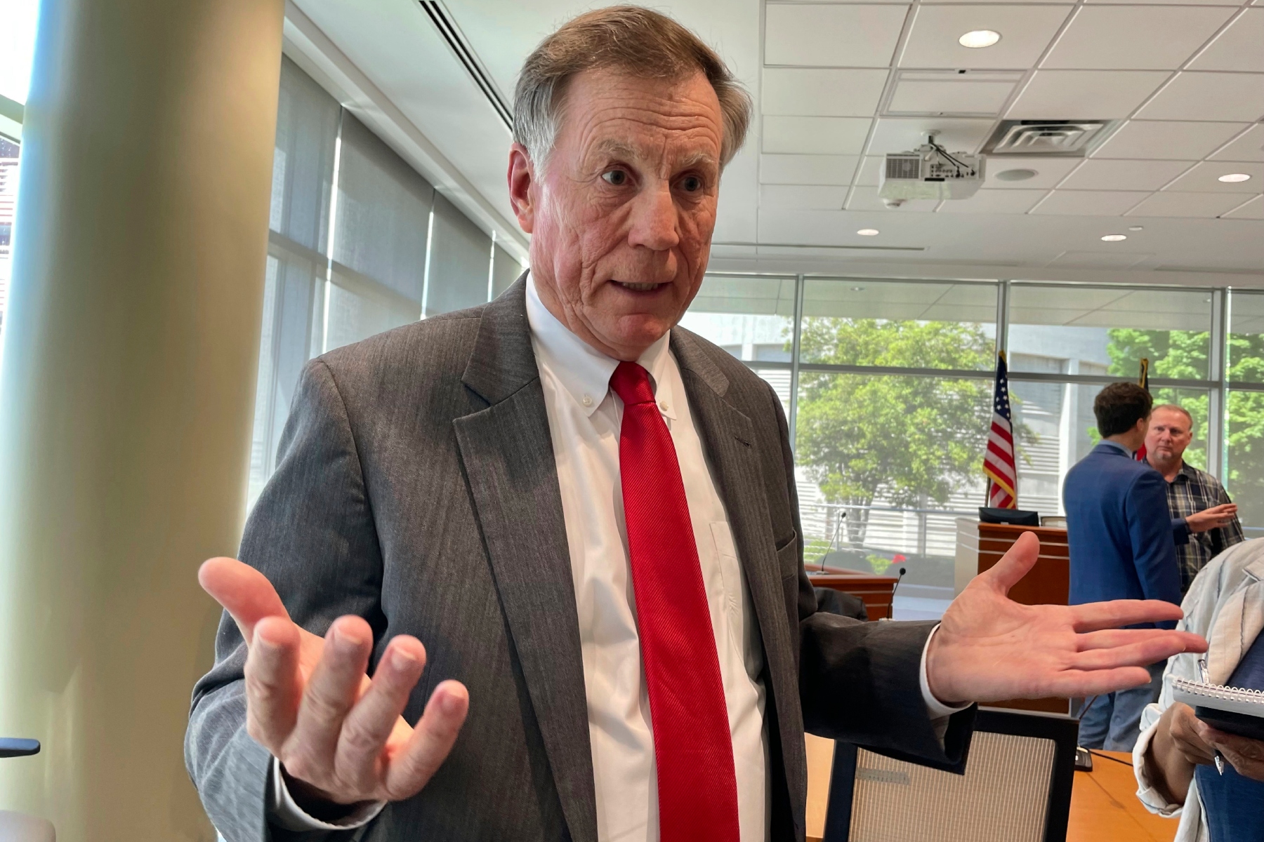 FILE - North Carolina Insurance Commissioner Mike Causey talks to reporters at the Albemarle Building in Raleigh, N.C., April 24, 2023. (AP Photo/Hannah Schoenbaum, file)