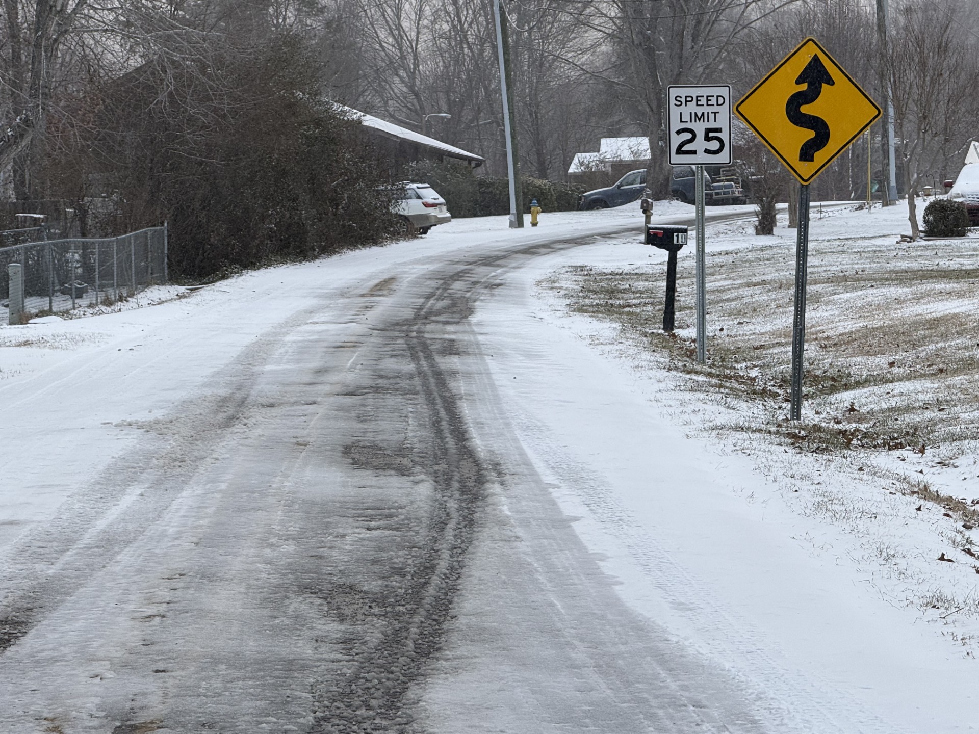 Candler Knob Road covered in snow and ice Saturday morning, Jan. 11, 2025.