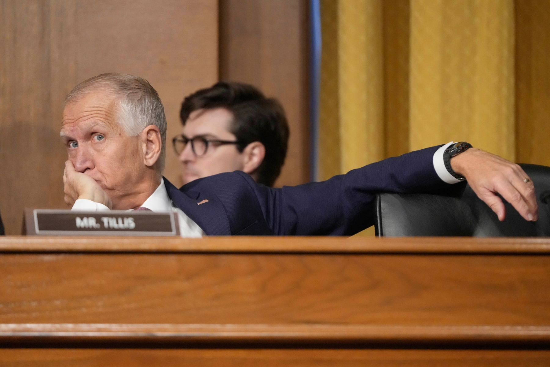 Sen. Thom Tillis, R-N.C., listens as U.S. Trade Representative Jamieson Greer as he testifies before the Senate Finance Committee on Capitol Hill in Washington, Tuesday, April 8, 2025. (AP Photo/Mark Schiefelbein)