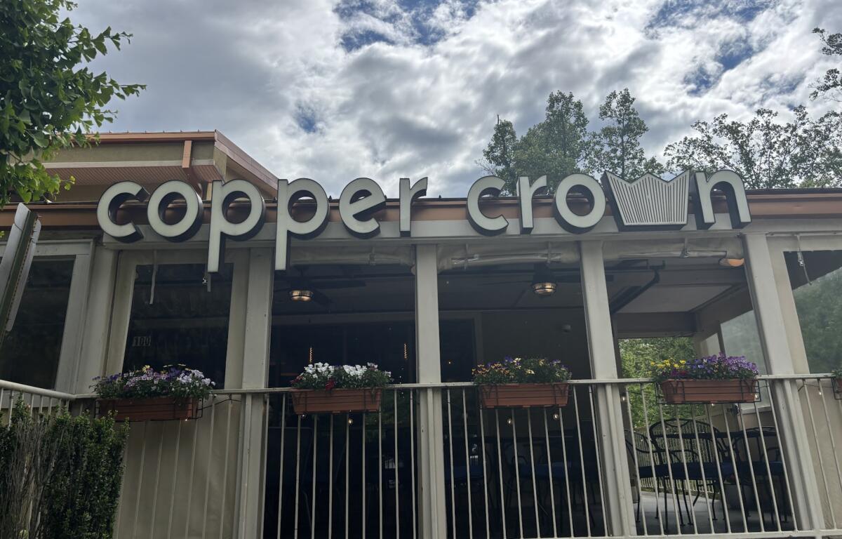 The sign for "Copper Crown" restaurant.