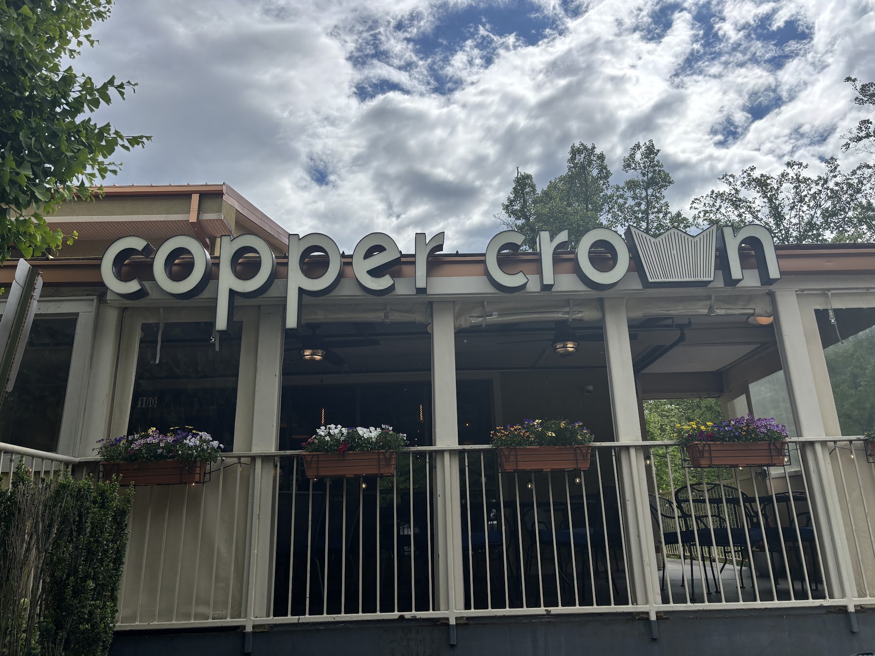 The sign for "Copper Crown" restaurant.