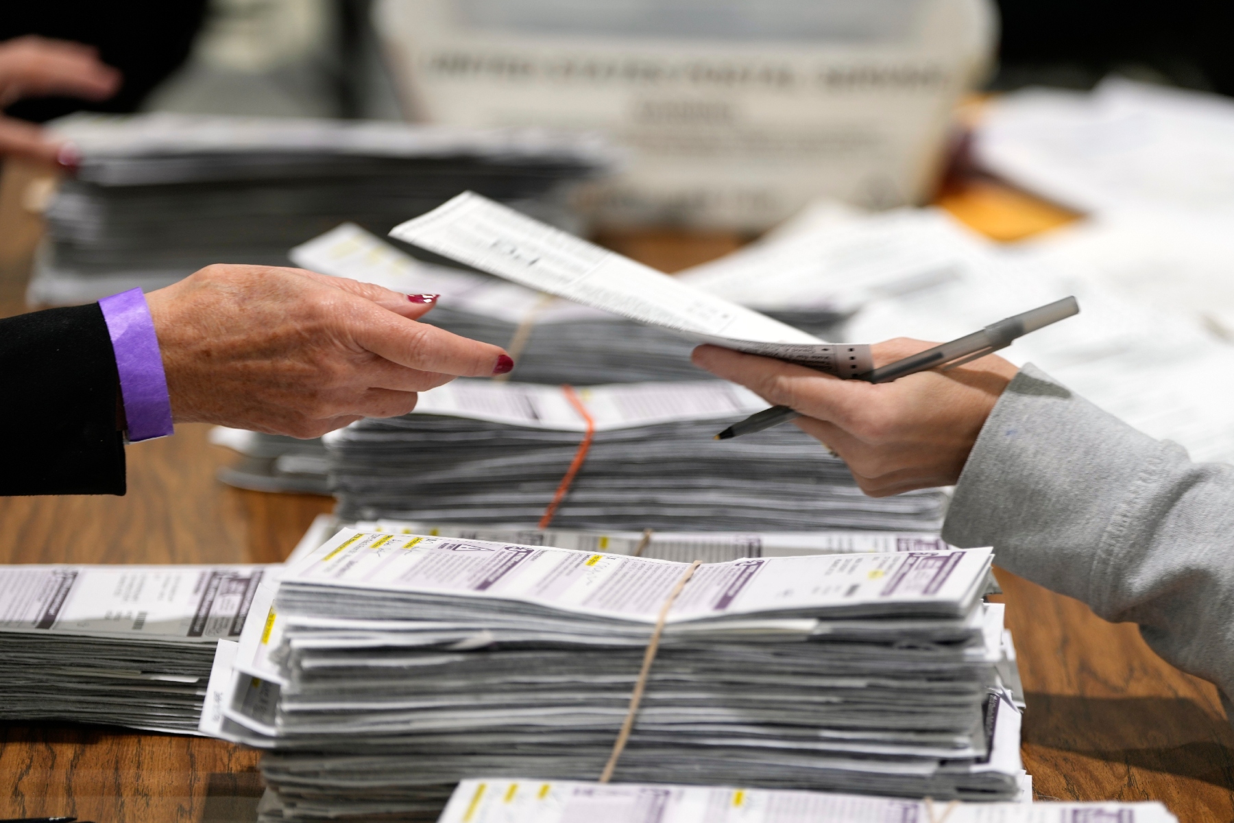 FILE - Election workers process ballots for the 2024 General Election, Nov. 5, 2024, in Milwaukee. (AP Photo/Morry Gash, File)