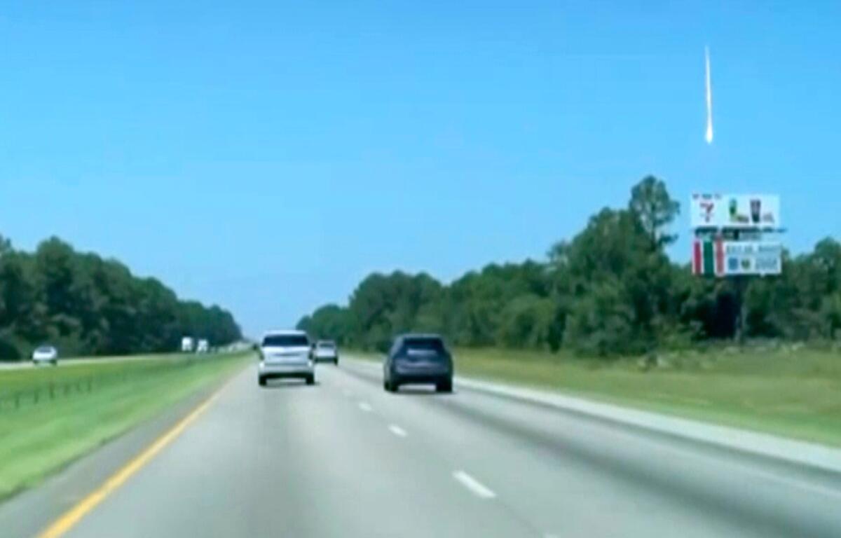 In this photo taken from video shows a bright object traveling in the sky in McDonough, Ga., Thursday, June 26, 2025. (Bryan Jennings Updyke via AP)