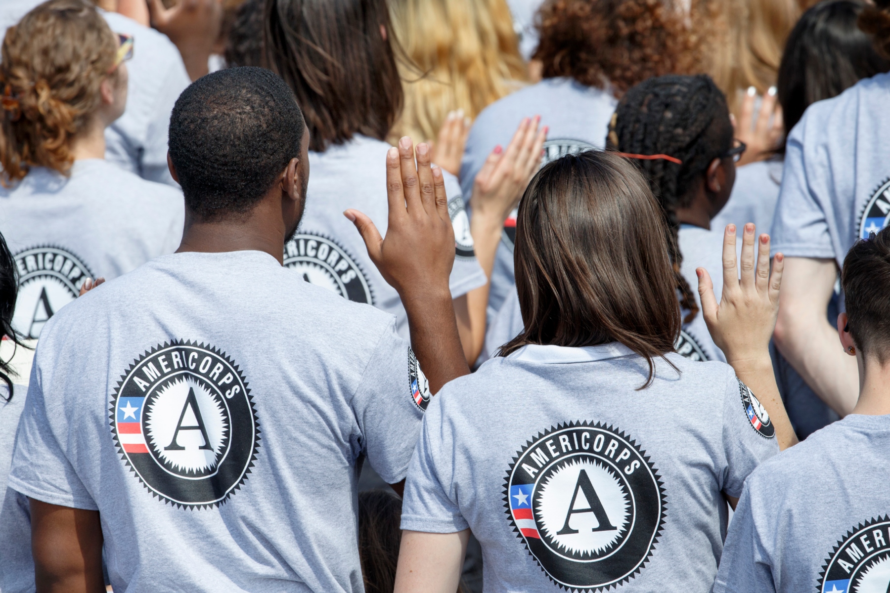 FILE - As President Barack Obama and former President Bill Clinton mark the 20th anniversary of the AmeriCorps national service program, hundreds of new volunteers are sworn in for duty at a ceremony, Friday, Sept. 12, 2014, on the South Lawn of the White House in Washington. (AP Photo/J. Scott Applewhite, file)