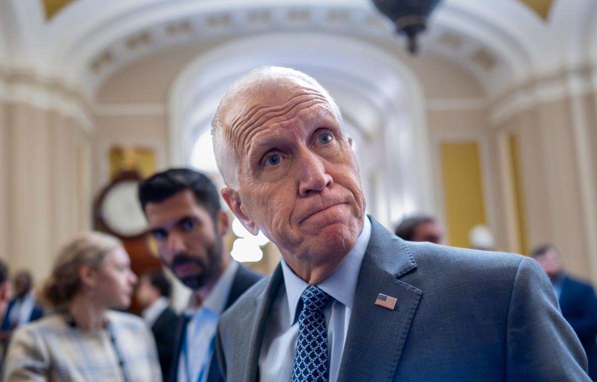 Sen. Thom Tillis, R-N.C., a member of the Senate Banking Committee, tells reporters that it would be a mistake for President Donald Trump to fire Federal Reserve Chair Jerome Powell, during a vote in the Senate, at the Capitol in Washington, Wednesday, July 16, 2025. (AP Photo/J. Scott Applewhite)