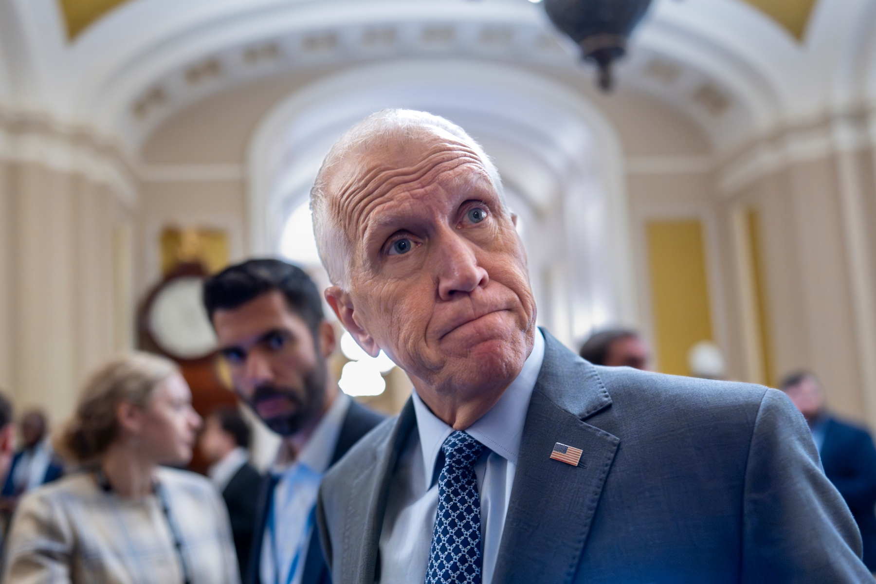 Sen. Thom Tillis, R-N.C., a member of the Senate Banking Committee, tells reporters that it would be a mistake for President Donald Trump to fire Federal Reserve Chair Jerome Powell, during a vote in the Senate, at the Capitol in Washington, Wednesday, July 16, 2025. (AP Photo/J. Scott Applewhite)