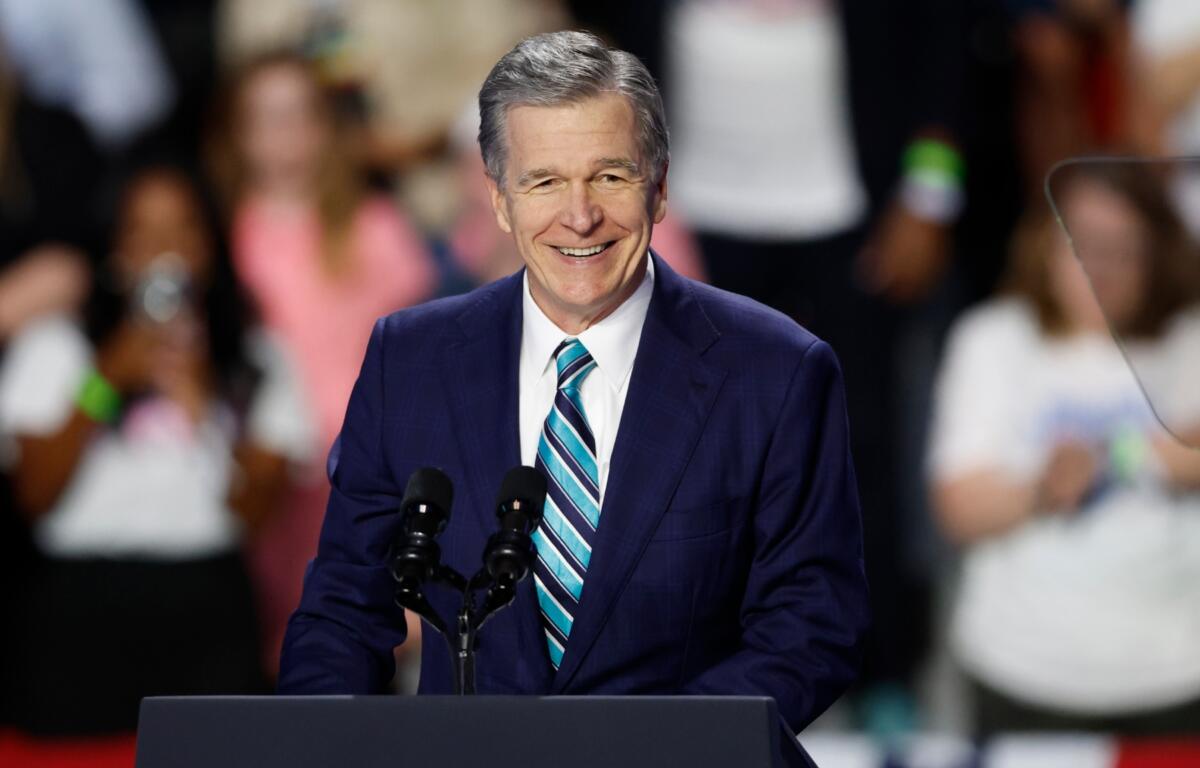 FILE - North Carolina Gov. Roy Cooper speaks at a campaign event in Charlotte, N.C., Sept. 12, 2024. (AP Photo/Nell Redmond, File)