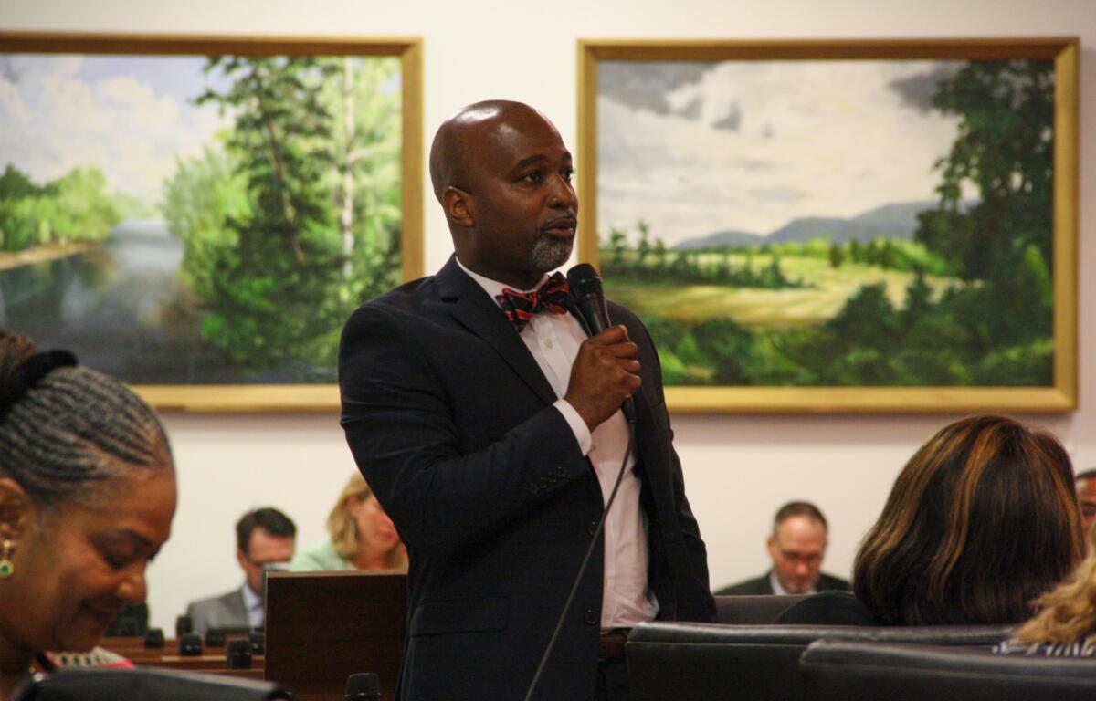 Rep. Zack Hawkins, D-Durham, speaks against an anti-DEI bill on the House floor in the North Carolina Legislative Building in Raleigh, N.C., Wednesday, June 25, 2025. (AP Photo/Makiya Seminera)