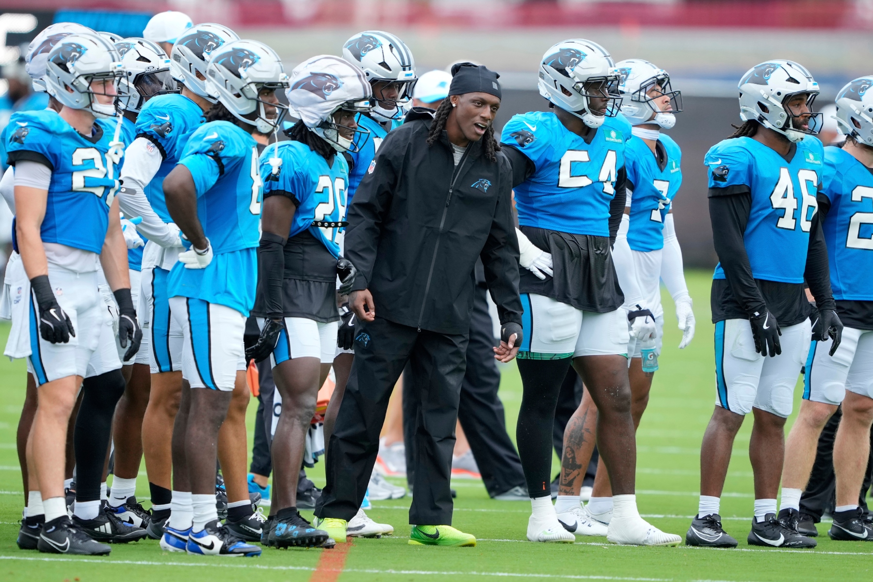 Carolina Panthers cornerback Jaycee Horn watches during an NFL football dual training camp with the Cleveland Browns Wednesday, Aug. 6, 2025, in Charlotte, N.C. Horn was involved in a car accident on his was to camp. (AP Photo/Chris Carlson)
