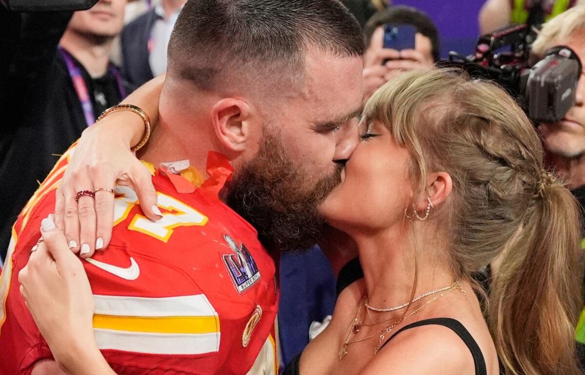 FILE - Kansas City Chiefs tight end Travis Kelce (87) and Taylor Swift kiss after the Chiefs defeated the San Francisco 49ers in the NFL Super Bowl 58 football game on Feb. 11, 2024, in Las Vegas. (AP Photo/John Locher, File)