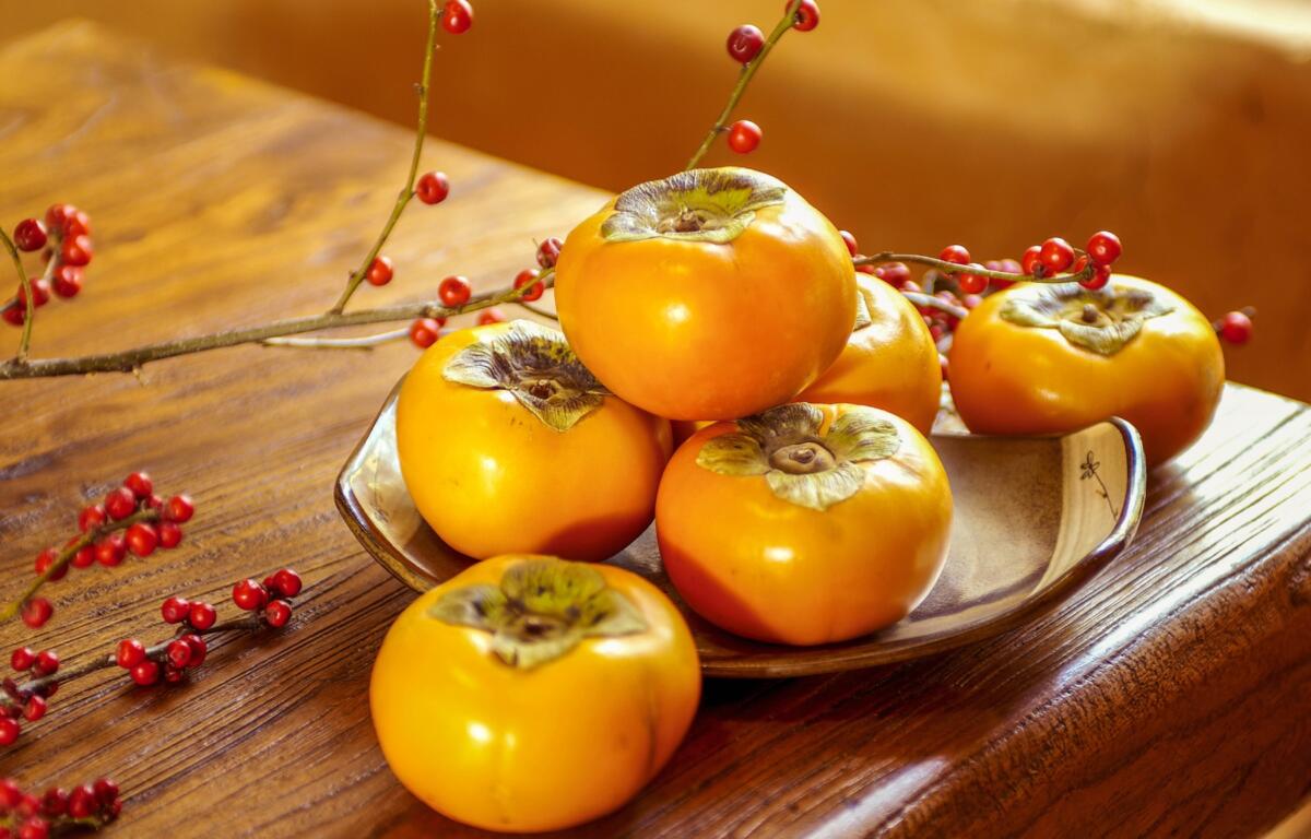 According to folklore, a persimmon seed can reveal the winter forecast.