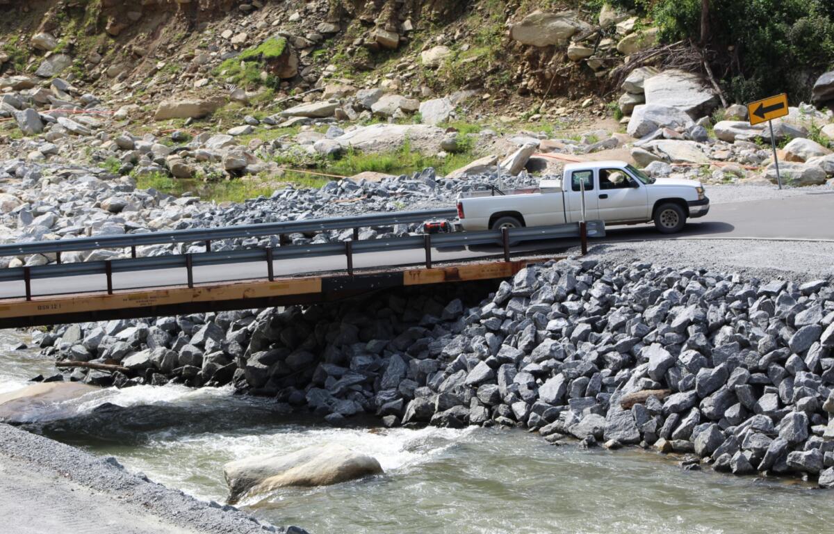 The state spent about $25 million on the interim roadway, which also included installing temporary railcar bridges to span washouts.