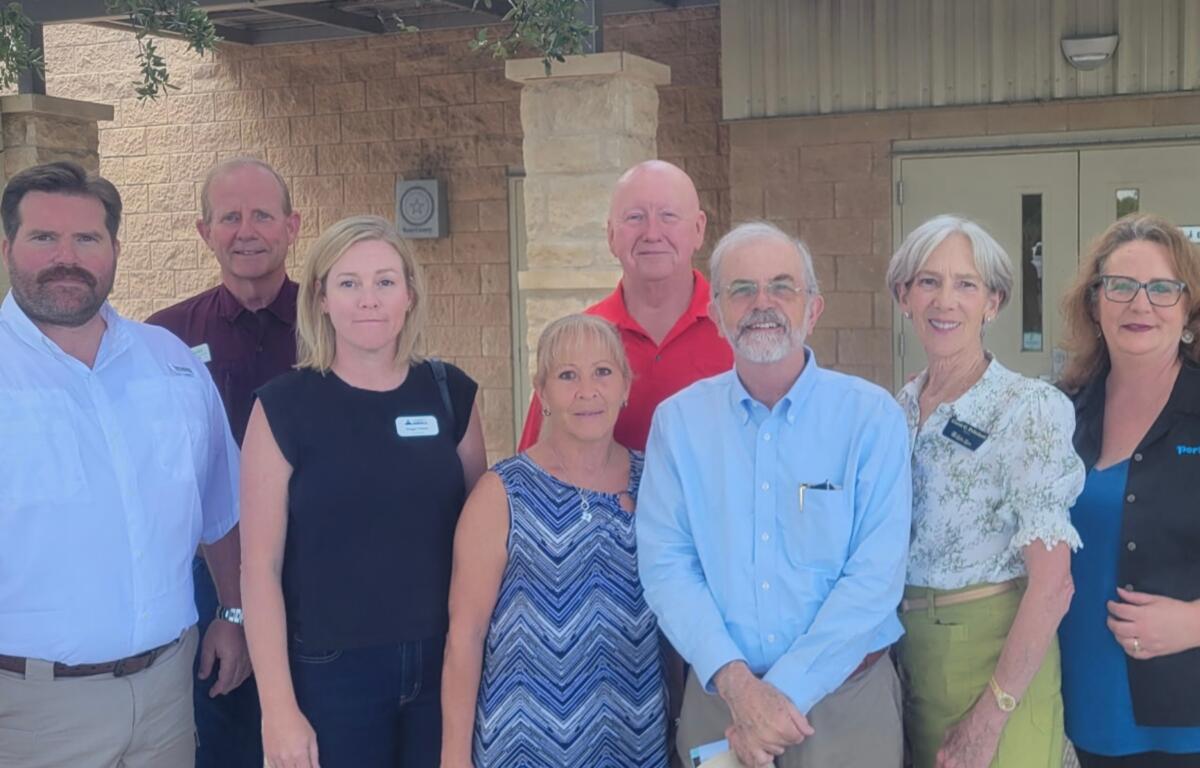 From left, Marshall Mayor Aaron Haynie, Portland, Texas, Mayor Pro Tem Green, Asheville City Councilwoman Maggie Ullman, Kerrville, Texas, Mayor Pro Tem Brenda Hughes, Avery County Commission Vice Chairman Dennis Aldridge, Kerrville, Texas, Mayor Joe Herring, Lake Lure Mayor Susan Pritchett and Portland, Texas Mayor Skurow.