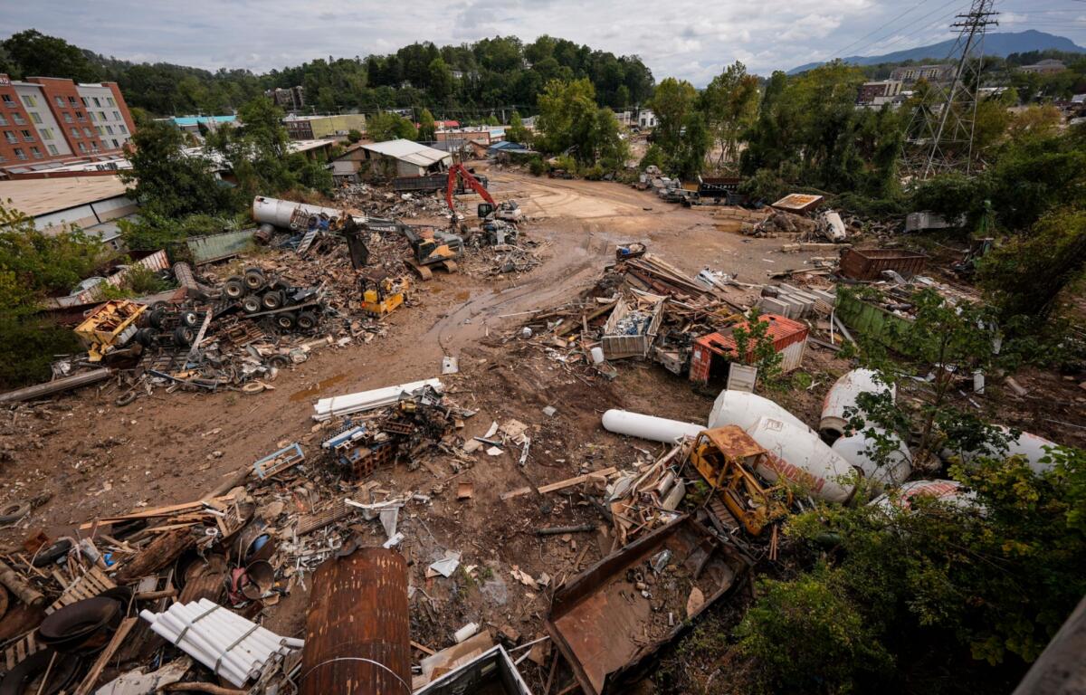 FILE - Debris from the aftermath of Hurricane Helene is seen, Sept. 30, 2024, in Asheville, N.C. (AP Photo/Mike Stewart, File)