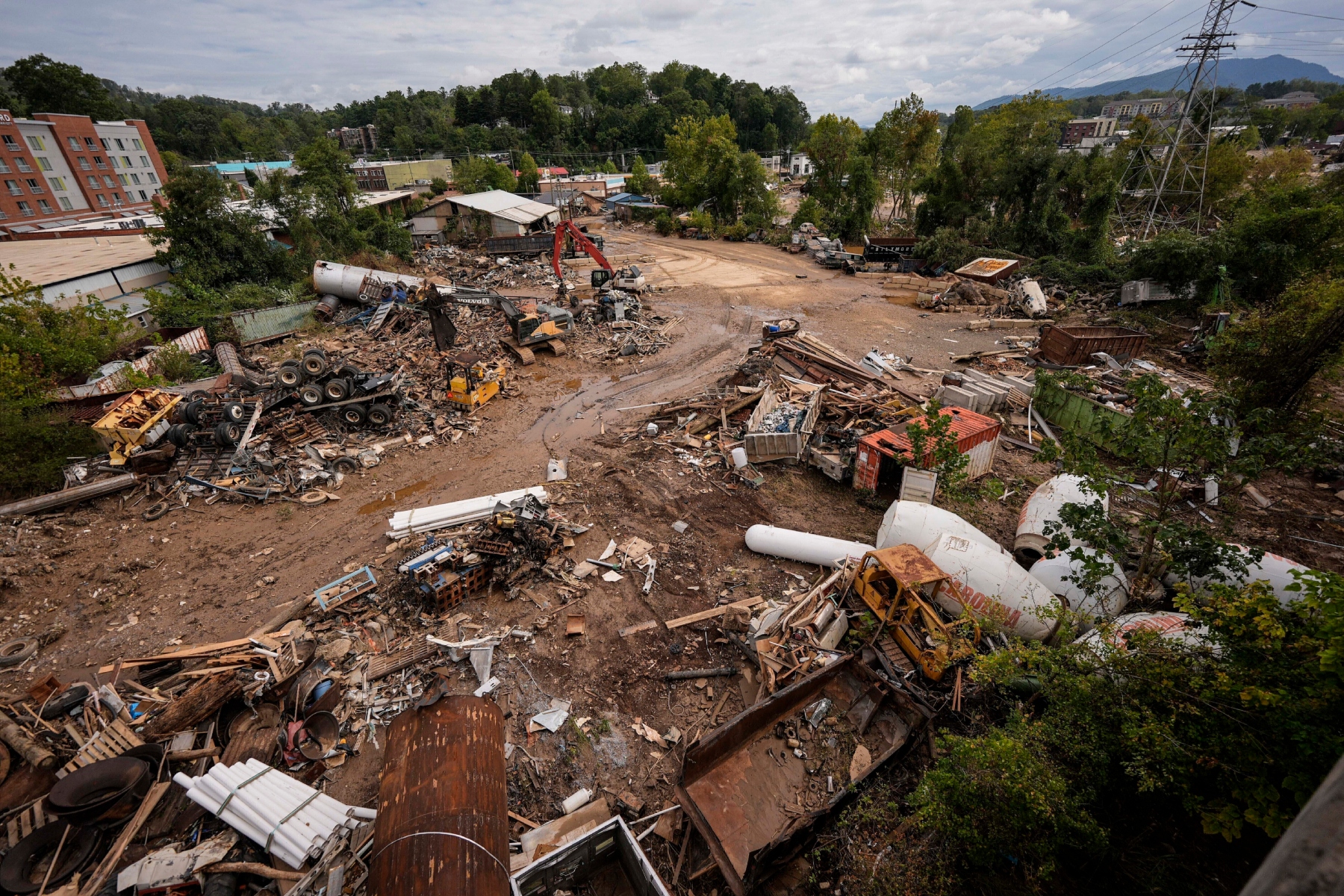 FILE - Debris from the aftermath of Hurricane Helene is seen, Sept. 30, 2024, in Asheville, N.C. (AP Photo/Mike Stewart, File)