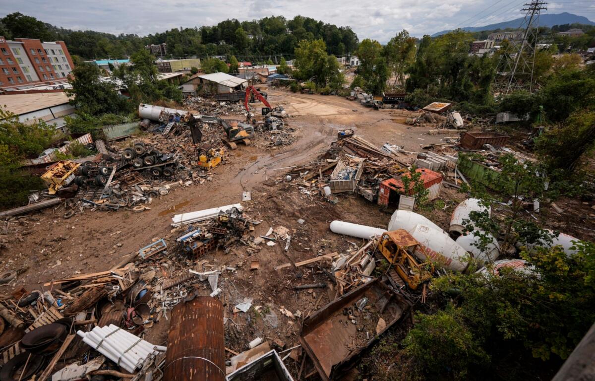 FILE - Debris from the aftermath of Hurricane Helene is seen, Sept. 30, 2024, in Asheville, N.C. (AP Photo/Mike Stewart, File)