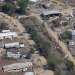 A view of damage in Asheville, N.C., is seen during an aerial tour with President Joe Biden who looked at areas impacted by Hurricane Helene near Asheville, N.C., Wednesday, Oct. 2, 2024. (AP Photo/Susan Walsh)