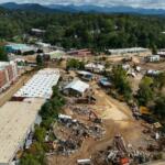 Debris is seen in the aftermath of Hurricane Helene, Monday, Sept. 30, 2024, in Asheville, N.C. (AP Photo/Mike Stewart)