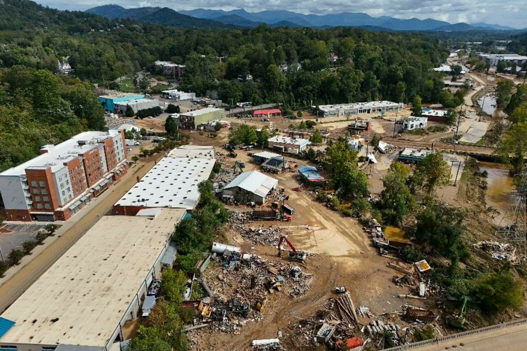 Debris is seen in the aftermath of Hurricane Helene, Monday, Sept. 30, 2024, in Asheville, N.C. (AP Photo/Mike Stewart)