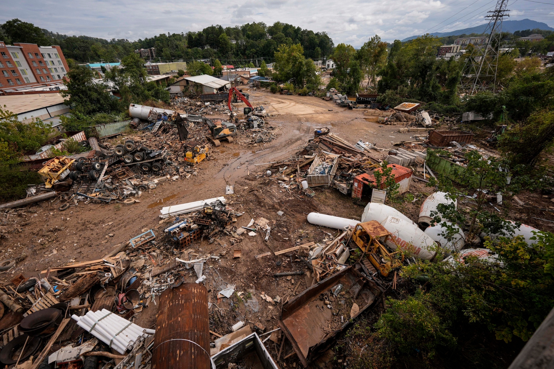 FILE - Debris from the aftermath of Hurricane Helene is seen, Sept. 30, 2024, in Asheville, N.C. (AP Photo/Mike Stewart, File)