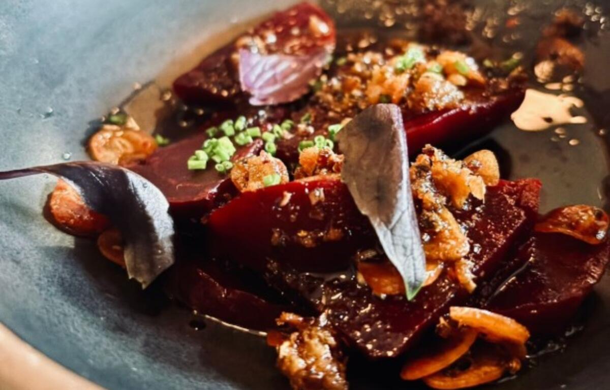 Beets with carrots, crispy pork and ponzu sauce