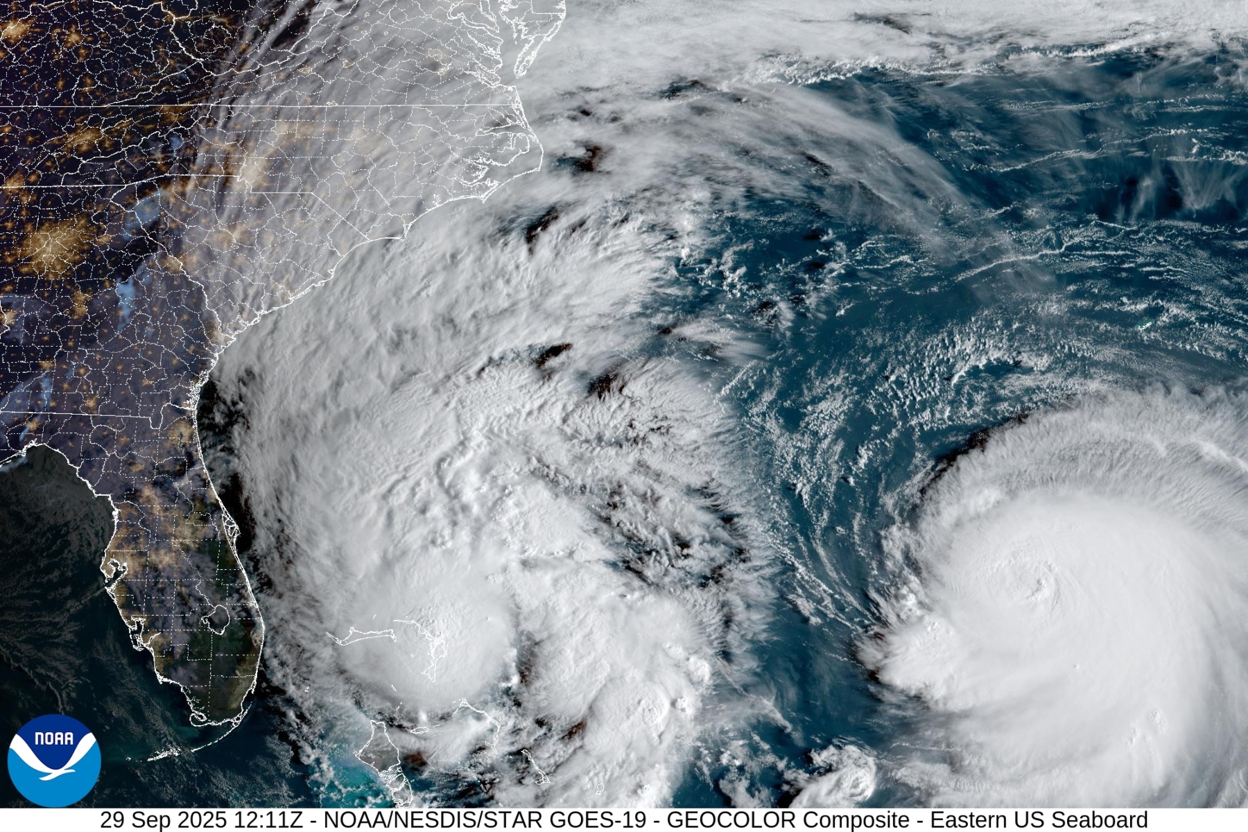 A satellite image Monday morning shows clouds extending 1,000 miles from Imelda's center all the way into Central Pennsylvania, while Humberto continues to churn in the Atlantic.