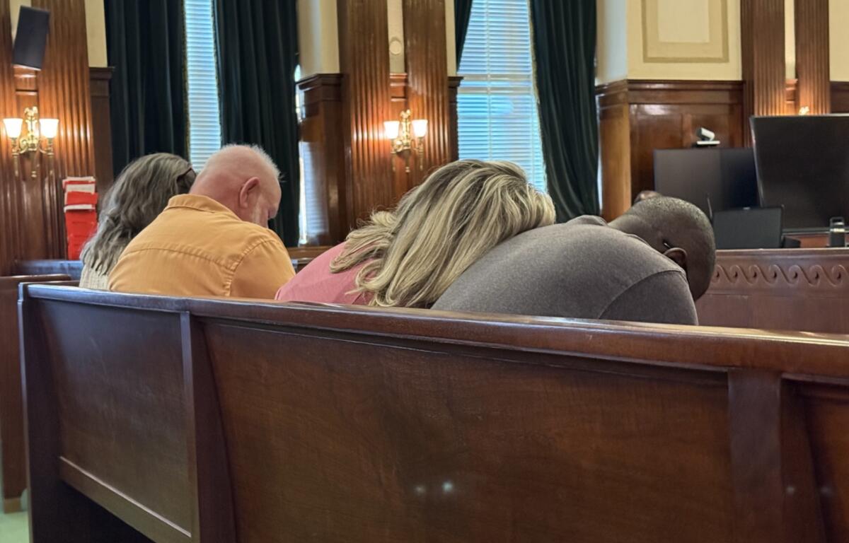 Riley's family, from left, Tracy Moore, Michael Brent Farlow, wait for the verdict.