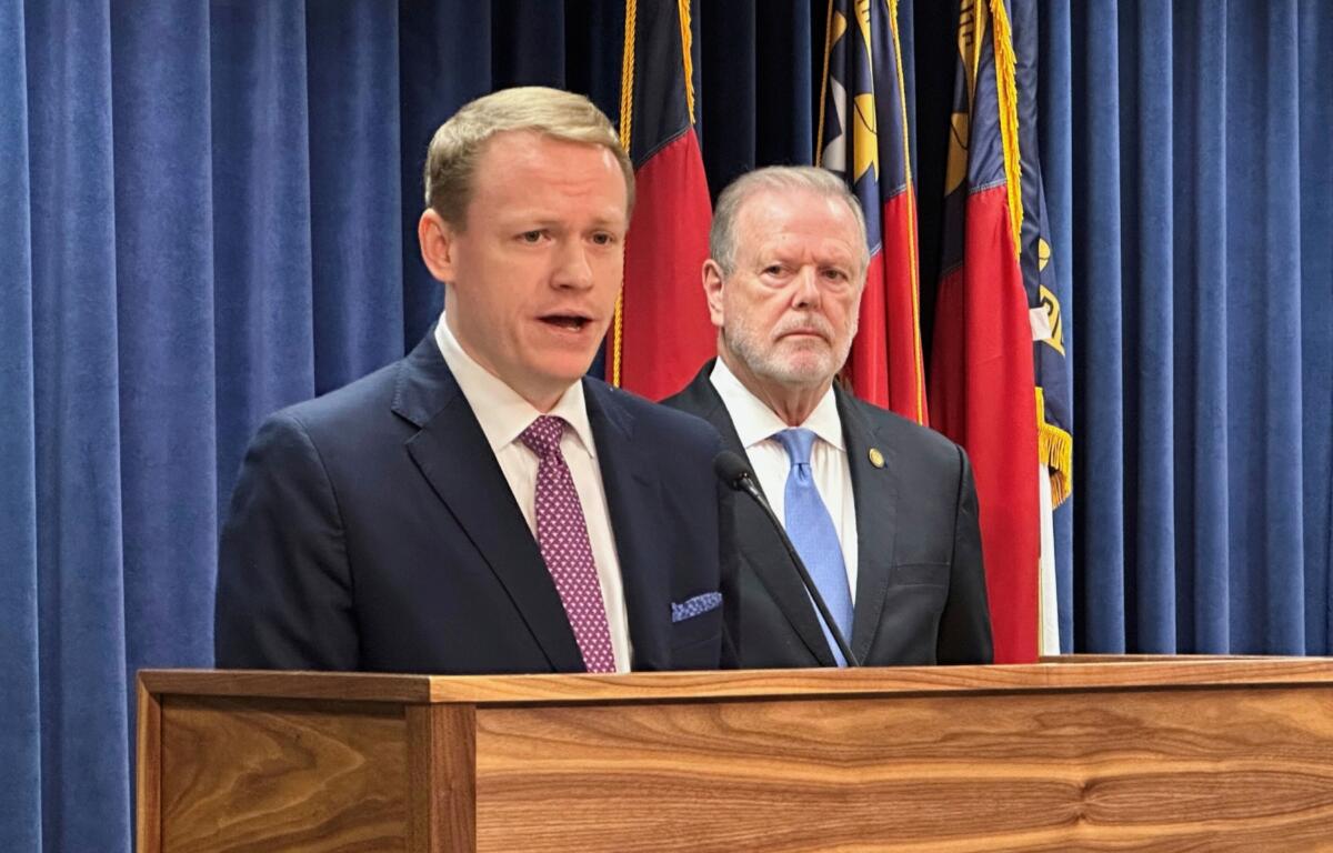 FILE - North Carolina state House Speaker Destin Hall, R-Caldwell, left, speaks while state Senate leader Phil Berger, R-Rockingham, listens during a news conference at the North Carolina Legislative Building in Raleigh, N.C., Sept. 11, 2025 (AP Photo/Gary D. Robertson, File)