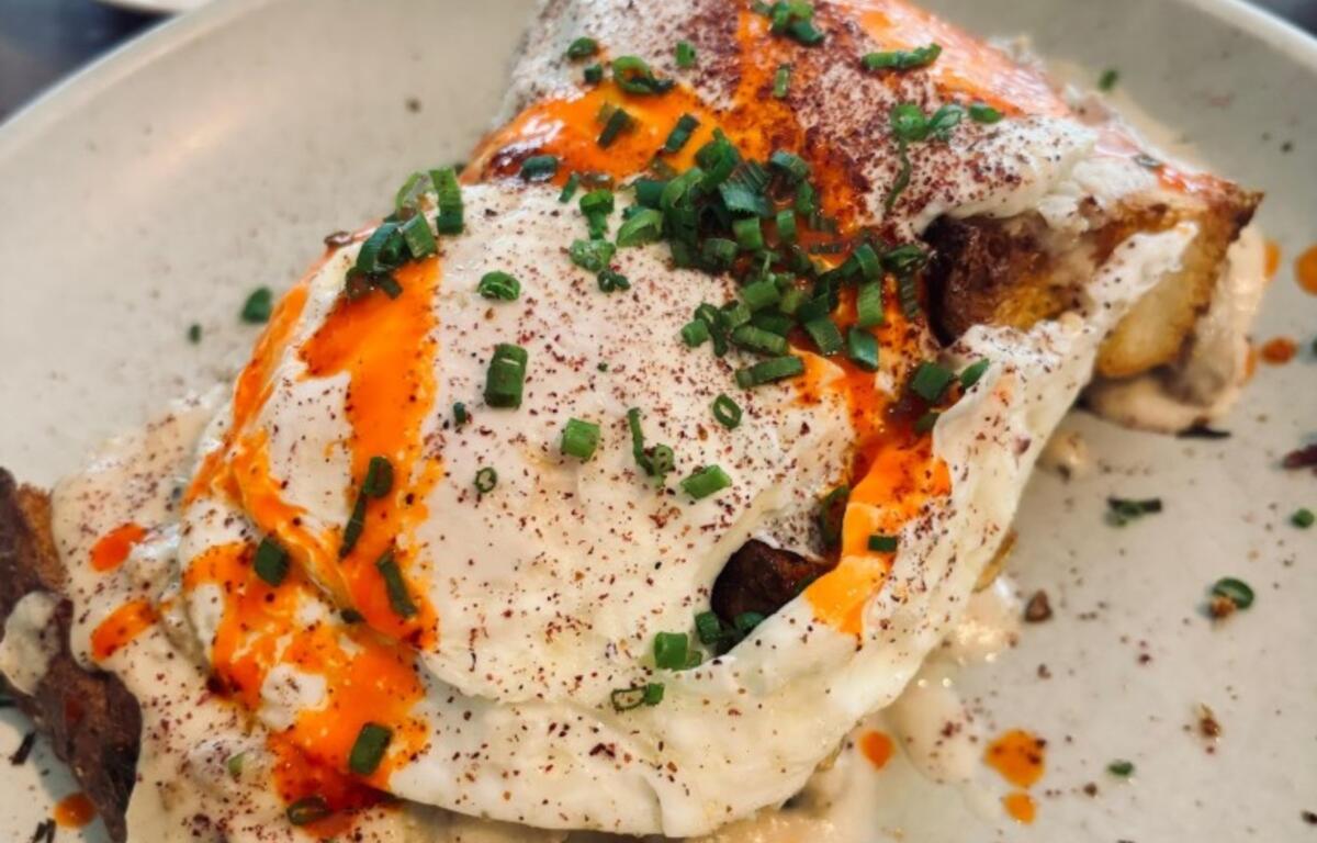 The focaccia and gravy -- soft and springy Italian bread with golden crust, topped with sausage gravy, Parmesan, hot sauce and an over-easy egg, offered a clever take on a traditional concept.
