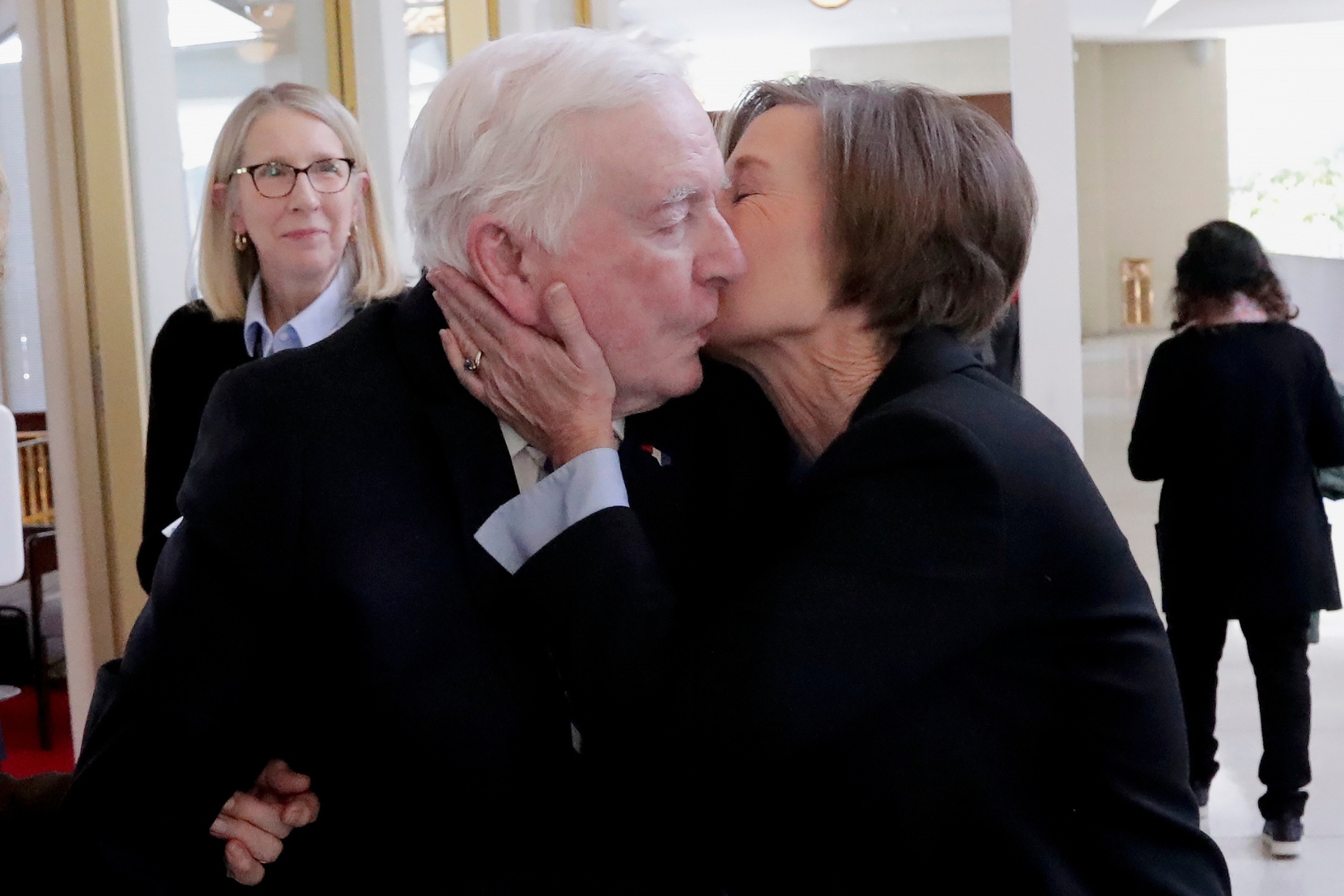 FILE - North Carolina Lt. Gov. Rachel Hunt, right, kisses her father, former North Carolina Gov. Jim Hunt, left, after she presided over the Senate session at the Legislative Building, Jan. 8, 2025, in Raleigh, N.C. (AP Photo/Chris Seward, File)