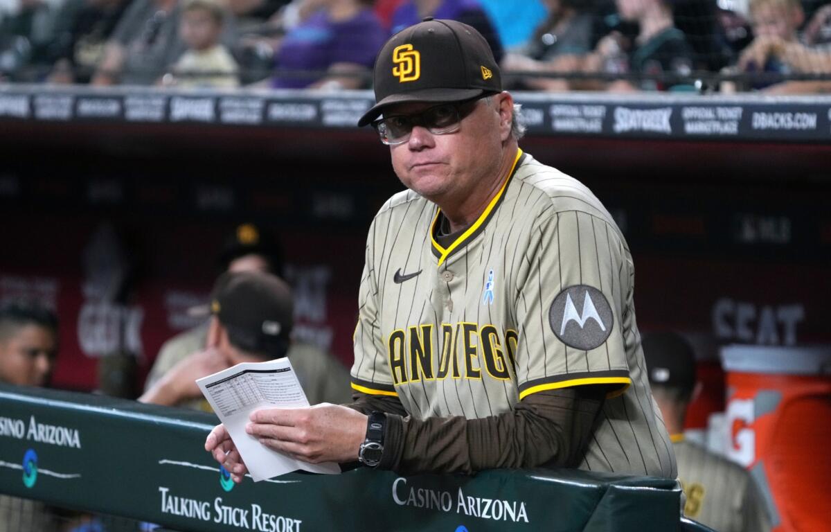 FILE - San Diego Padres manager Mike Shildt (8) in the first inning during a baseball game against the Arizona Diamondbacks, June 15, 2025, in Phoenix. (AP Photo/Rick Scuteri, File)