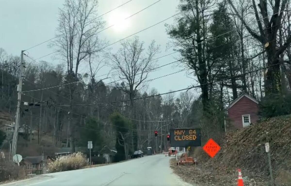 The US 64 corridor remains open only to local traffic and work crews.