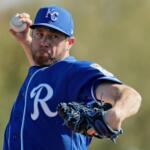 Kansas City Royals pitcher Greg Holland throws during spring training baseball practice Sunday, Feb. 16, 2020, in Surprise, Ariz. (AP Photo/Charlie Riedel)